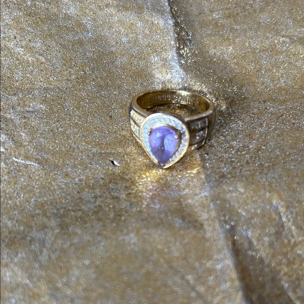 Gold Ring with Purple Teardrop Stone